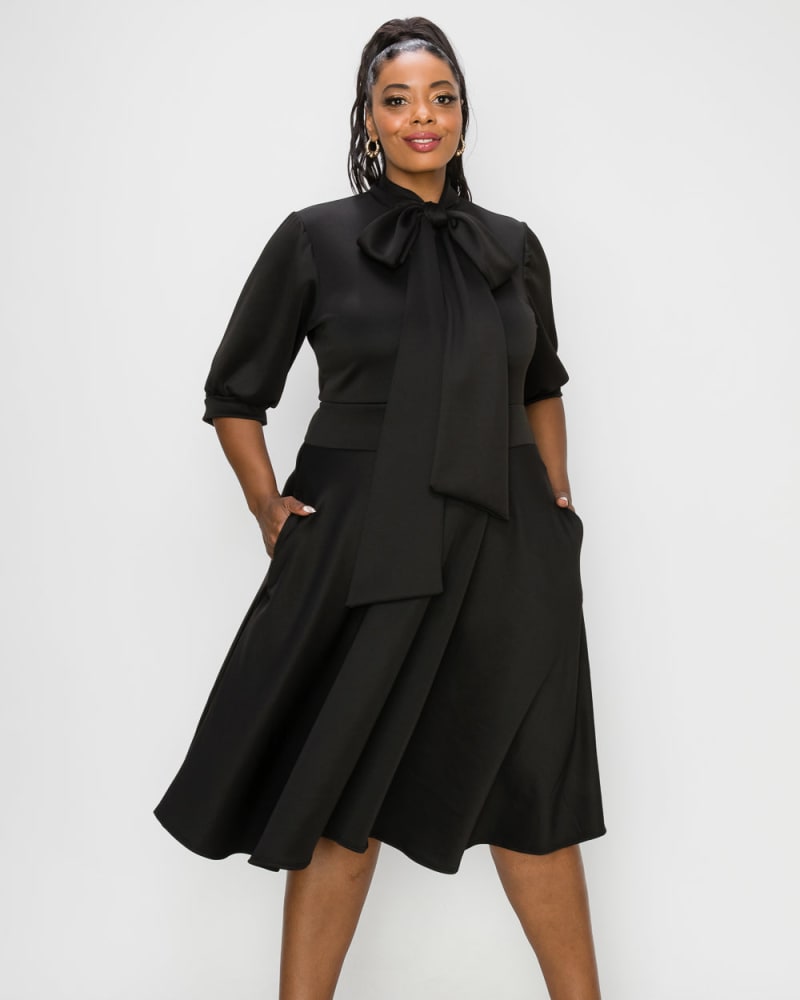 Front of a model wearing a size 1X Casey Scuba Flare Dress in Black by L I V D. | dia_product_style_image_id:240727